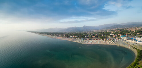 Panoramic aerial view of Lido di Camaiore and Viareggio shoreline in summer season