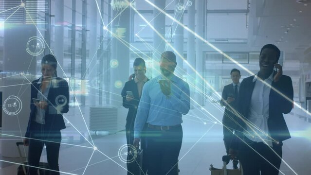 Animation of network of connections against diverse businesspeople using smartphones at office