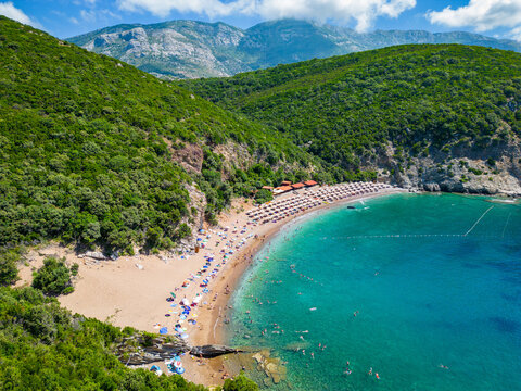 Queen's Beach ( Kraljichina Beach ) in Canj, Montenegro. Aerial view of paradise tropical beach, surrounded by green hills. Montenegro. Balkans. Europe.