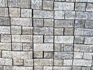 Textured Stone Wall: Full Frame Pattern of Brickwork and Cobblestone Pavement on Ground