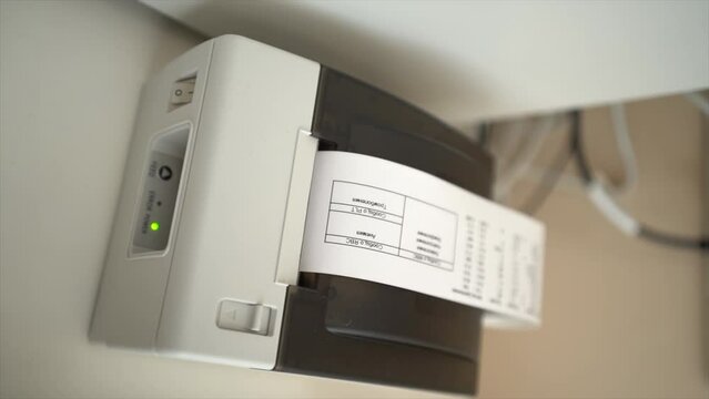 Laboratory test results. Veterinary clinic. Printer printing analysis results. Modern equipment. Contemporary veterinary clinic