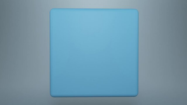 This is a stock motion graphic that shows the rotation of a 3D blue cube in a seamless loop.