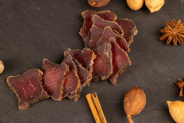 dried red beef meat on the kitchen table