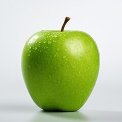 Perfect fresh green Apple on light background with water drops. Full depth-of-field.
