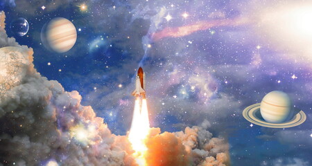 rockets launch into space on the starry sky. spacecraft flies into space with clouds of smoke. Elements of this image furnished by NASA
