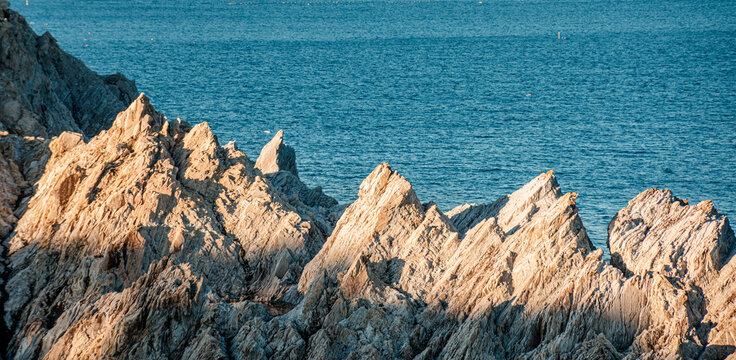 This is "Jodogahama", a scenic spot in Miyako City, Iwate Prefecture, Japan. Beautiful white rock formations at sunset