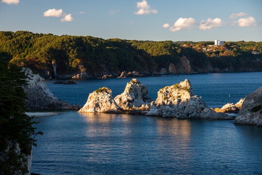 This is "Jodogahama", a scenic spot in Miyako City, Iwate Prefecture, Japan. Beautiful white rock formations at sunset