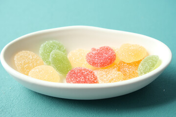 colorful candy sweet jelly in a bowl on table 
