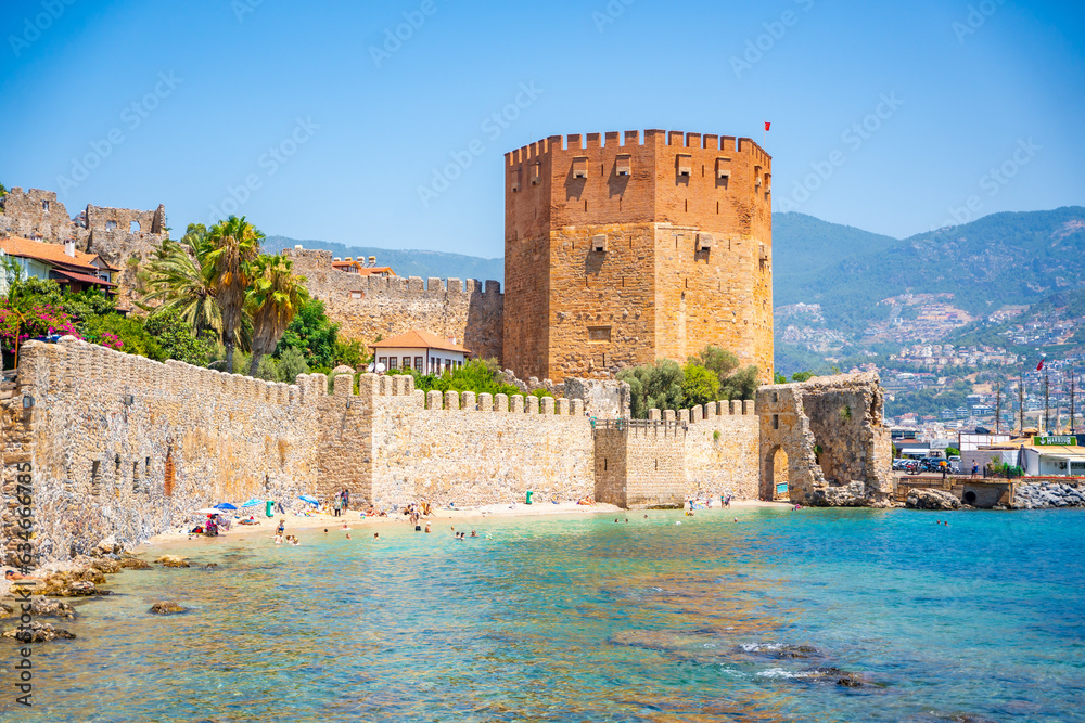 Wall mural Kizil Kule or Red Tower of Alanya castle in Alanya city, Antalya Province on the southern coast of Turkey