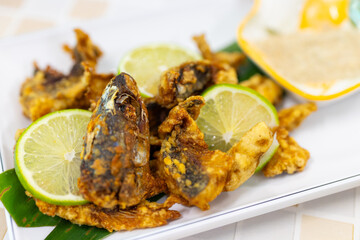 Crispy fish fillet dish in Asian restaurant