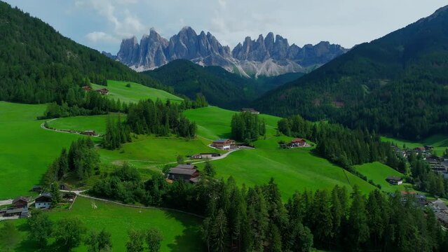 Santa Maddalena village and The Dolomites mountains in background, Val di Funes valley, Trentino Alto Adige region, Italy, Europe.