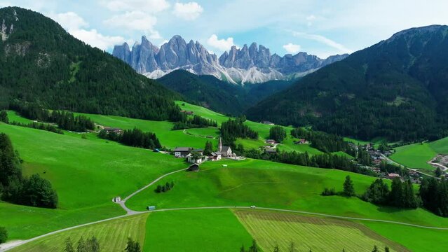 Santa Maddalena village and The Dolomites mountains in background, Val di Funes valley, Trentino Alto Adige region, Italy, Europe.