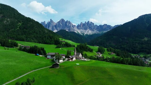 Santa Maddalena village and The Dolomites mountains in background, Val di Funes valley, Trentino Alto Adige region, Italy, Europe.