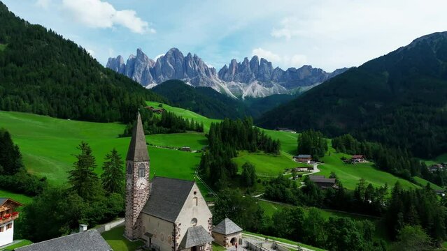 Santa Maddalena village and The Dolomites mountains in background, Val di Funes valley, Trentino Alto Adige region, Italy, Europe.