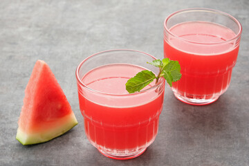 Fresh watermelon juice with mint leaf, cold pressed juice. 
