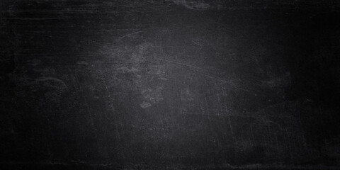 Horizontal black board or chalkboard wall texture background