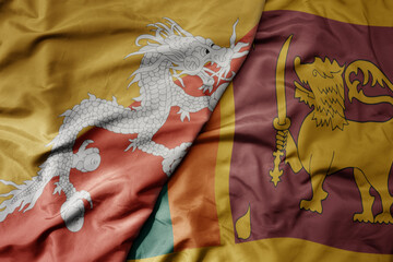 big waving realistic national colorful flag of bhutan and national flag of sri lanka .