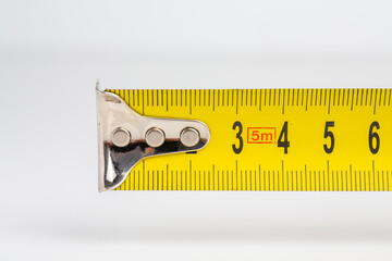 Capturing Distances, showcasing a measuring tape in action, meticulously gauging various distances...