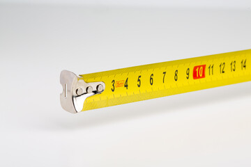Capturing Distances, showcasing a measuring tape in action, meticulously gauging various distances...