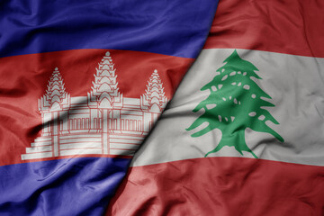 big waving realistic national colorful flag of cambodia and national flag of lebanon .