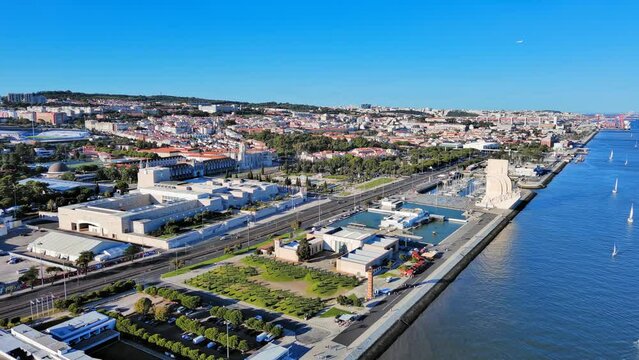 Lisbon: Aerial view of capital city of Portugal, Jeronimos Monastery (Mosteiro dos Jer&oacute;nimos) + Praca do Imperio Garden (Jardim da Pra&ccedil;a do Imp&eacute;rio) - landscape panorama of Europe from above