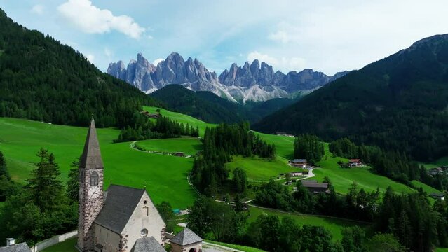 Santa Maddalena village and The Dolomites mountains in background, Val di Funes valley, Trentino Alto Adige region, Italy, Europe.