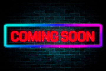 Fototapeta premium Coming Soon neon banner on brick wall background.