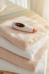 Pore cleaner on stack of towels