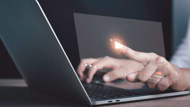 Video live streaming online on internet. Person using laptop watching content on website and finger play icon. Live concert, show or tutorial about subscription based live digital stream.
