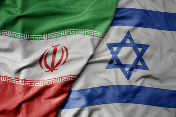 big waving realistic national colorful flag of iran and national flag of israel .