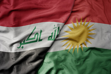 big waving realistic national colorful flag of iraq and national flag of kurdistan . - obrazy, fototapety, plakaty