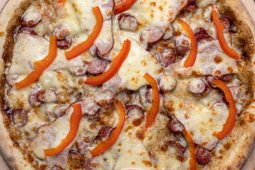 Italian cuisine. Delicious pizza on a dark background