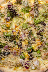 Italian cuisine. Delicious pizza on a dark background
