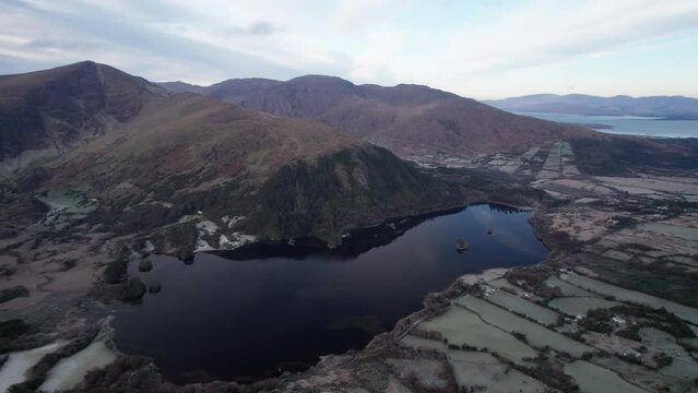 Spectacular 4K aerial footage of flying above Healy Pass and Glanmore Lake in winter, Kenmare, Kerry, Ireland