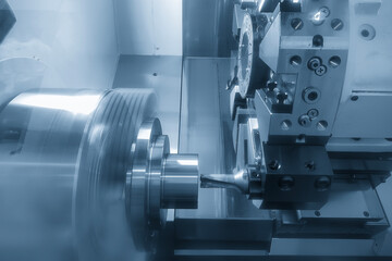 The  CNC lathe machine hole cutting the metal shaft parts by drill tool. - obrazy, fototapety, plakaty
