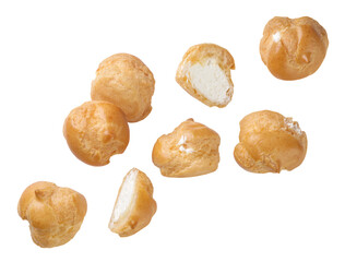 Profiteroles and halves fly close-up on a white background.