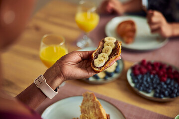 Delicious breakfast, croissant with chocolate and banana.