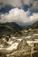 Retezat Carphatian Mountains with clouds in background, Romania