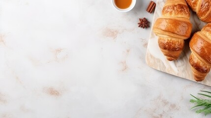 Obraz na płótnie Canvas Breakfast with croissant on stone background