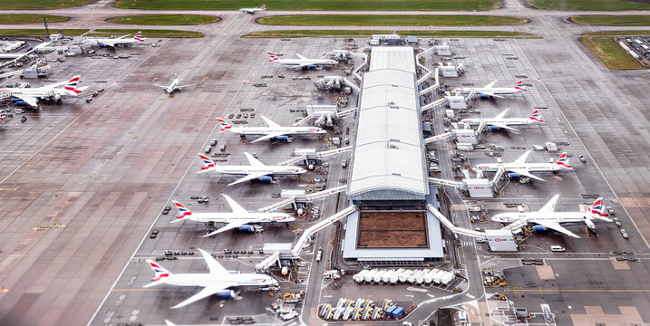 Heathrow, UK: aerial view of the airplanes parked at the Heathrow terminal