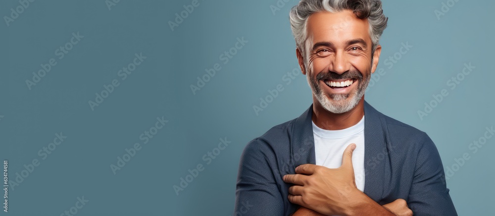 Poster Smiling middle aged man showing concept in open hand