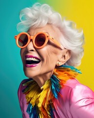 Obraz premium Portrait of Senior adult in colorful modern fashion and fun concept