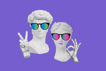 Antique statue's head David showing peace gesture and Aphrodite in sunglasses showing ok sign with...