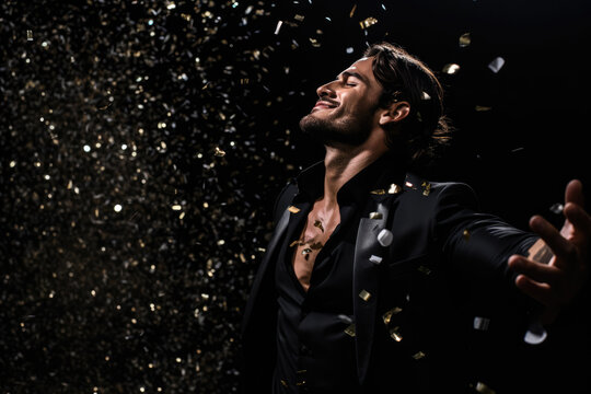 Beautiful Happy Man Tosses Up Sequins On Black Background. Happiness Sequins, The Impact Of Color, Seeing Things Differently, Brightening Your Mood, Keeping Busy With Positivity