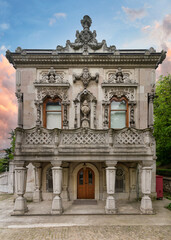 Fototapeta premium Side view of Ihlamur Pavilion, or Ihlamur Kasri, former imperial Ottoman summer pavilion constructed during the reign of Sultan Abdulmecid I, located in Nisantasi Ihlamur Yolu street, Istanbul, Turkey