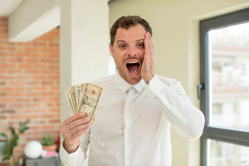 feeling happy and astonished at something unbelievable. dollar banknotes concept