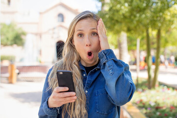 feeling extremely shocked and surprised. smartphone concept