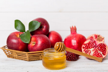 Flat lay composition with symbols jewish Rosh Hashanah holiday attributes on colored background, Rosh hashanah concept. New Year holiday Traditional. Top view with copy space