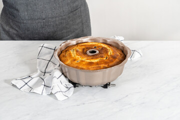 Lemon blueberry bundt cake with powdered sugar dusting
