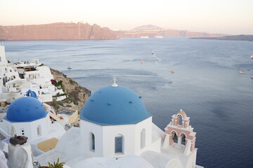 Blue dome roof in an orthodox church on a beautiful landscape in the bay of Santorini, Greece, Mediterranean Sea